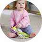 Fisher-Price Purple Monkey Musical Storybook Toy.