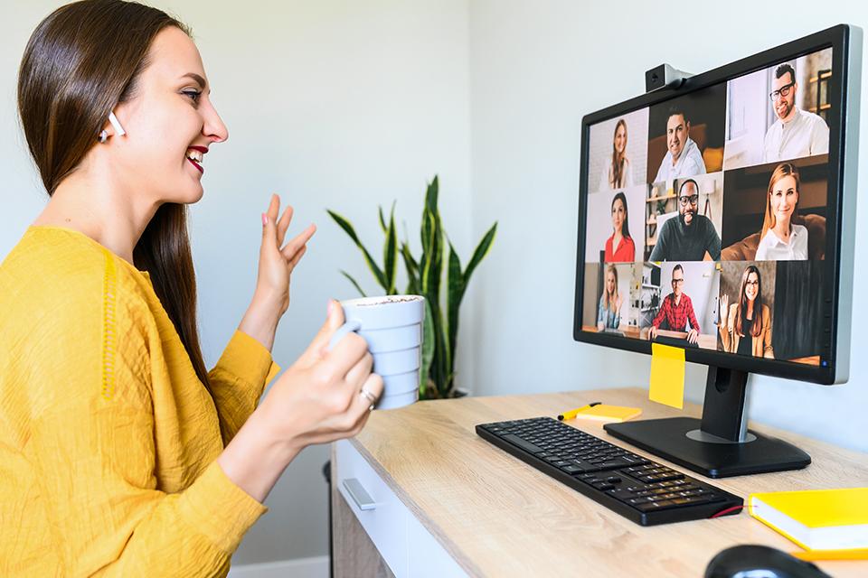 Woman using webcam to talk to friends online