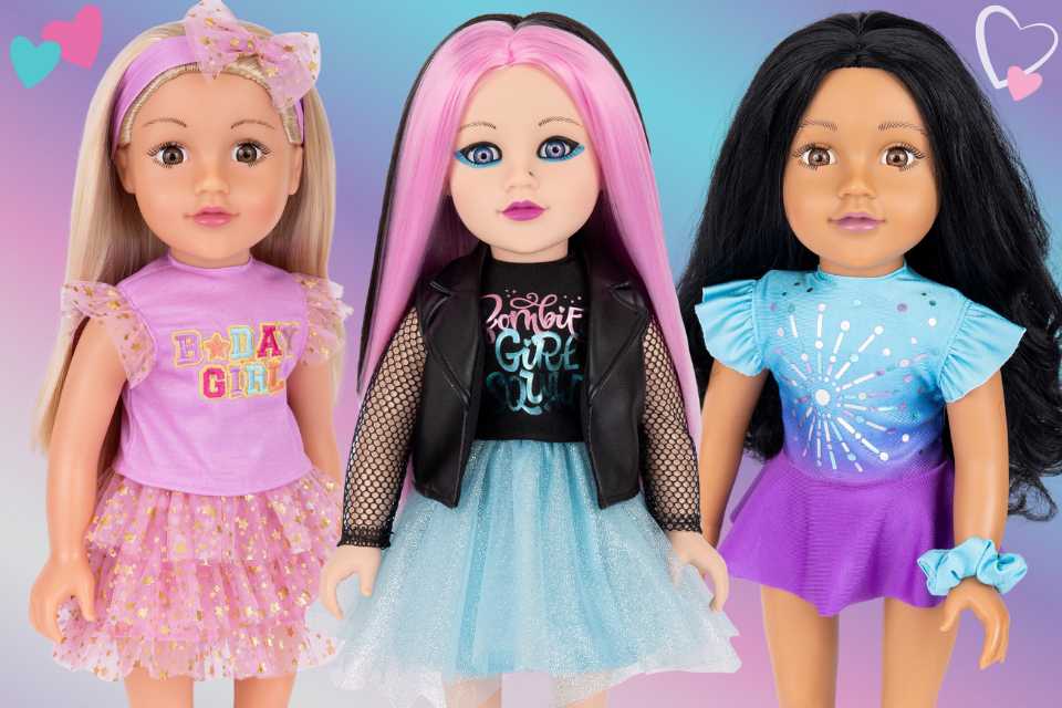 Three 18-inch DesignAfriend dolls dressed in different outfits, posed side by side on a rainbow coloured background with hearts.