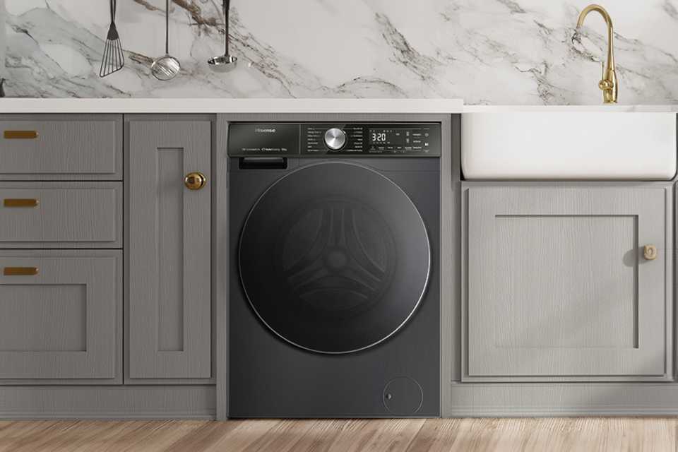 A Hisense S series washing machine placed in the laundry room.