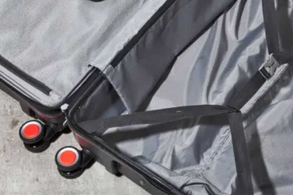 Rock expandable 8 wheel small hard suitcase in charcoal.