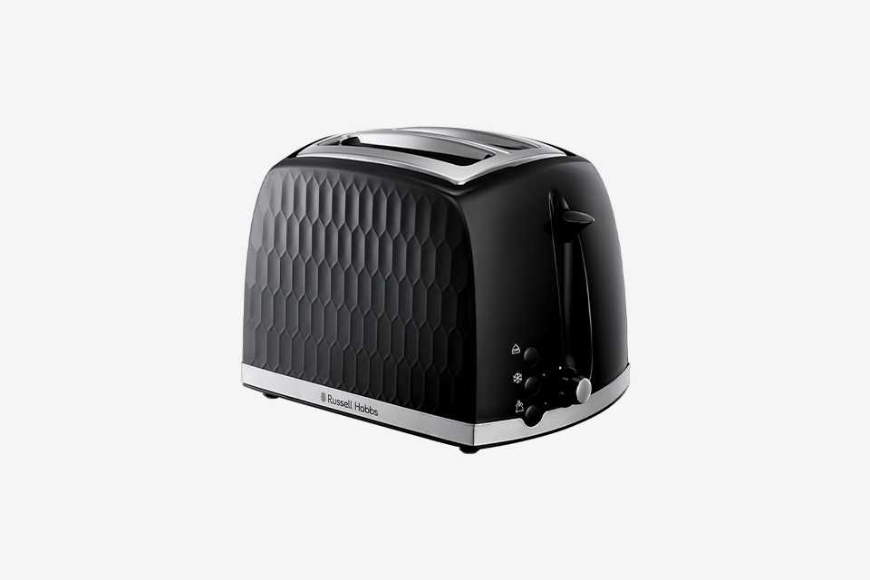A black Russell Hobbs plastic toaster with honeycomb textured design with stainless steel accents.