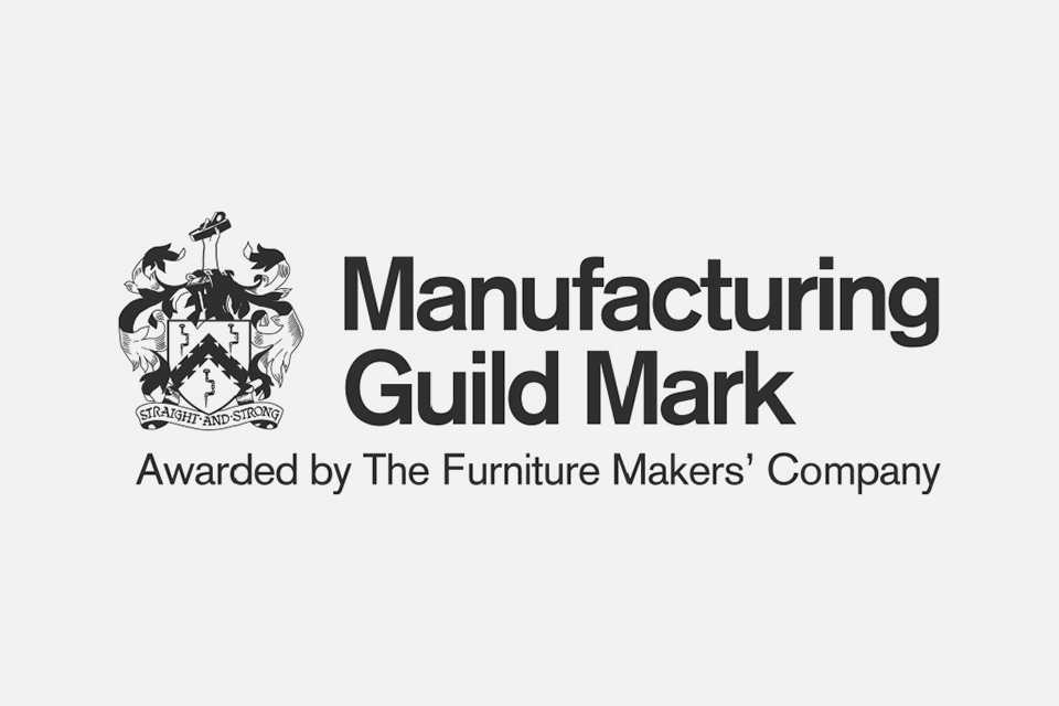 Logo of the Manufacturing Guild Mark.