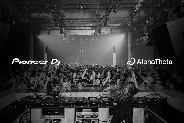 A black and white image of a DJ playing music to a crowd and Pioneer DJ written in white.