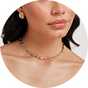 Gold necklaces.