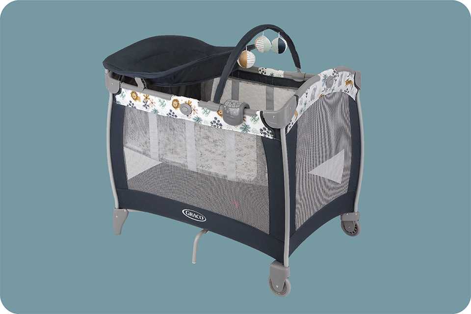 A Graco Contour Electra travel cot.