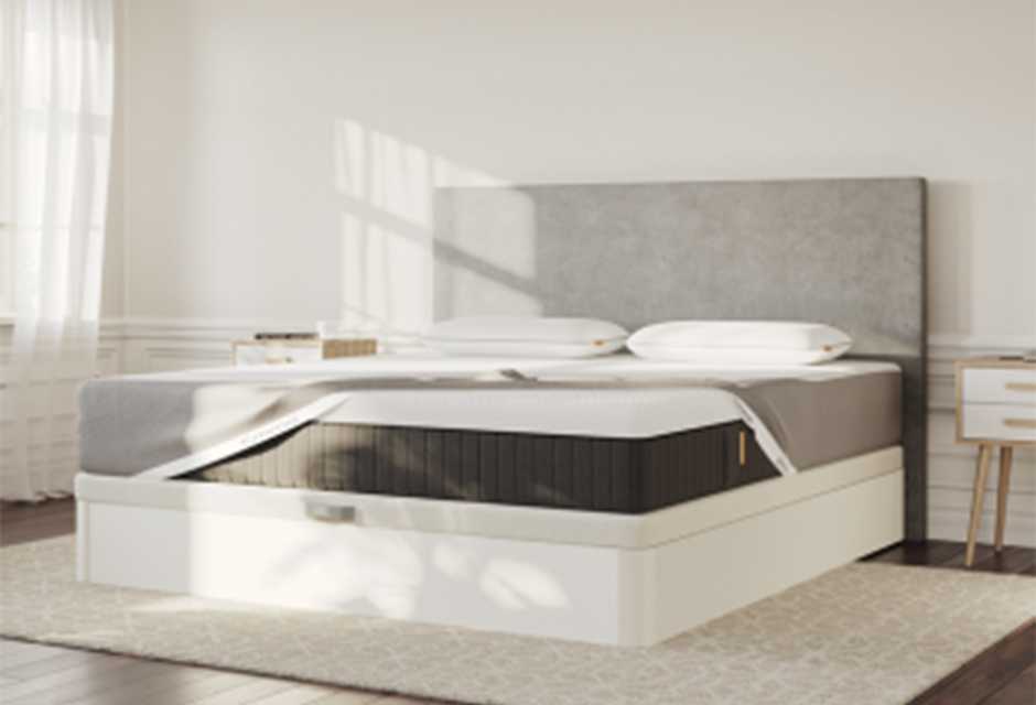 Bed with pillows on top and Emma mattress protector.