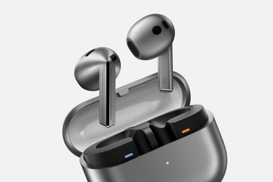 Samsung Galaxy Buds3 floating above silver case.