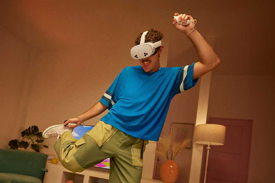 A man playing a VR game using Meta Quest 3S 128GB All-In-One Mixed Reality Headset.