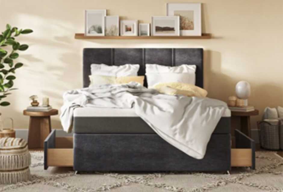 Emma mattress with bedding in a bedroom and Emma logo on top.