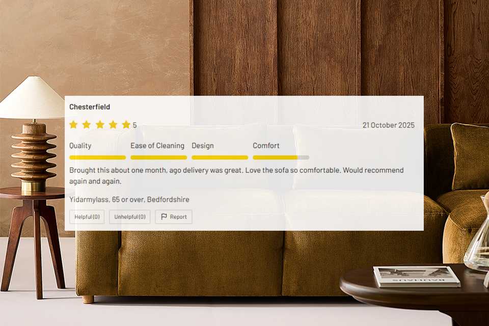 Close-up of a stylish brown velvet sofa with wooden side table and lamp, featuring a five-star customer review overlay praising quality and comfort, Habitat branding visible.