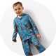 Child wearing blue Gruffalo-themed pyjamas with colourful animal prints, featuring button-up top and matching bottoms.