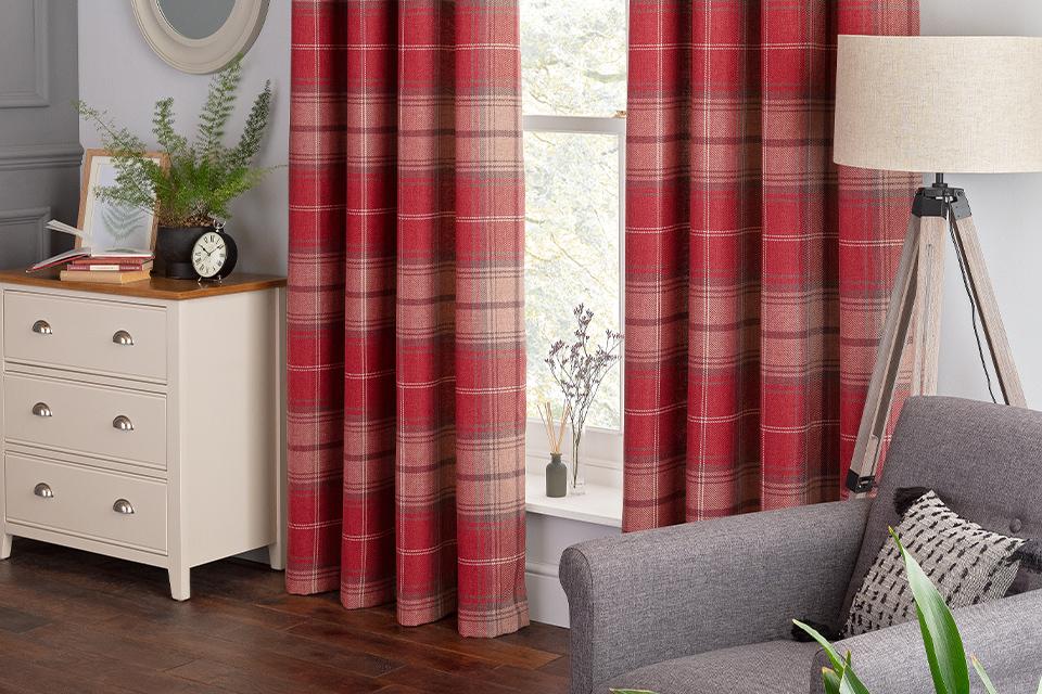 Red checkered curtains in a lounge.