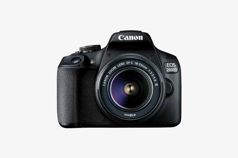 Canon EOS 2000D DSLR camera with 18-55mm DC lens.