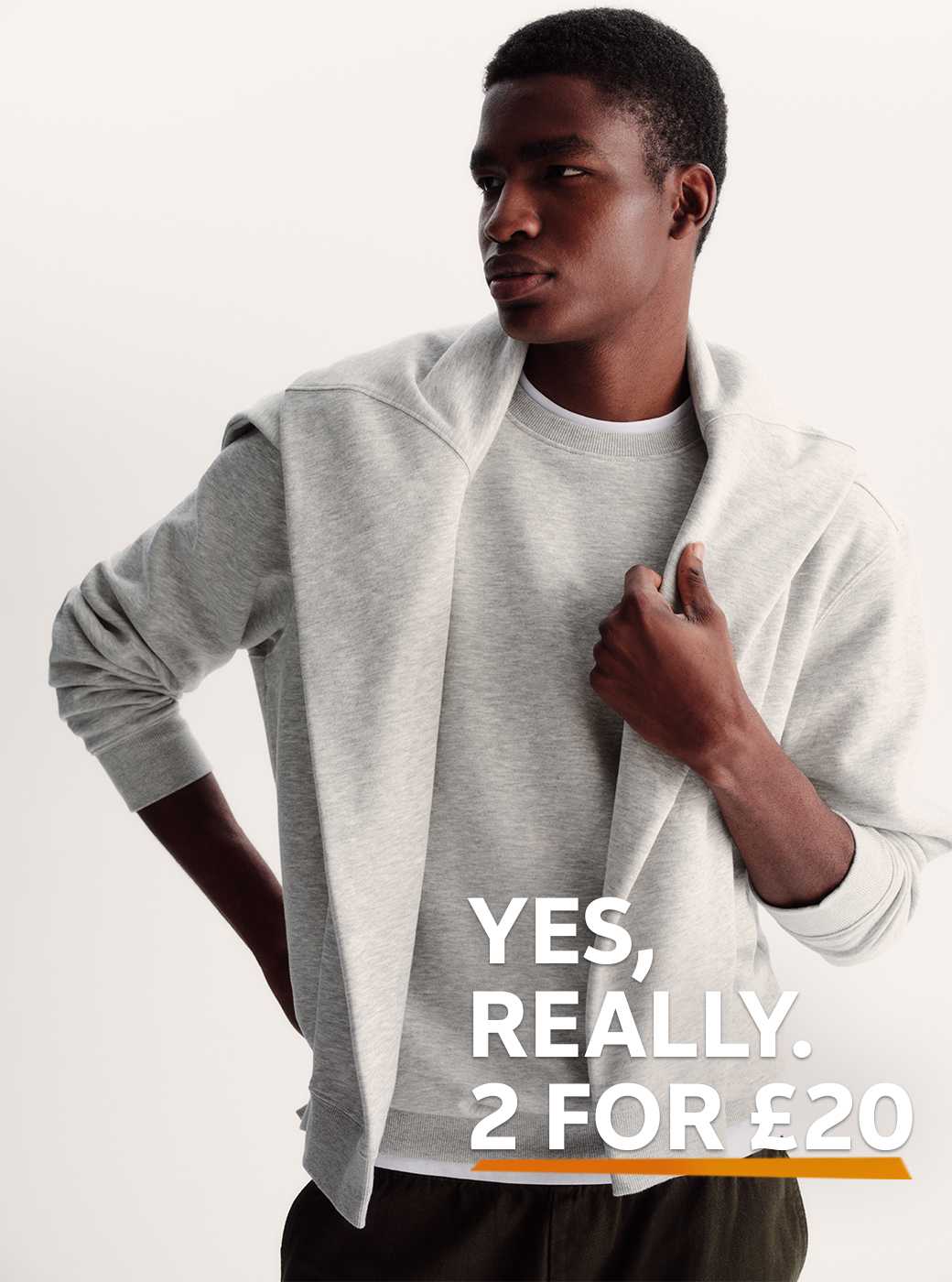 A woman wearing a neutral bubble hem jacket.