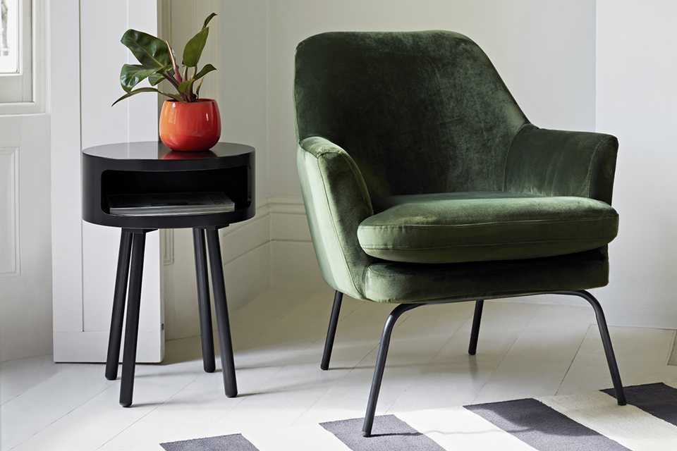 Occasional chair with side table.