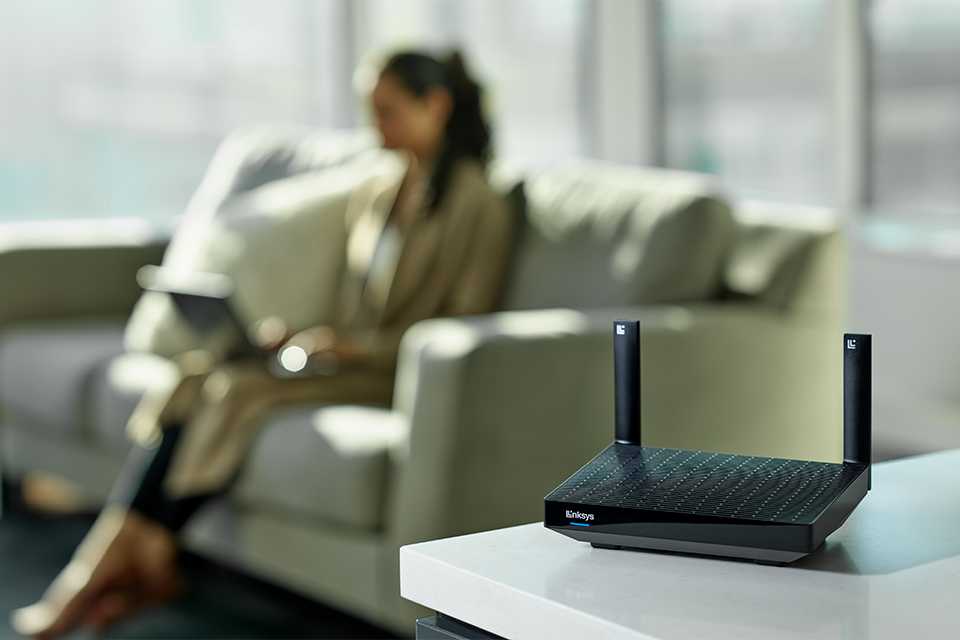 A wifi router on a table.