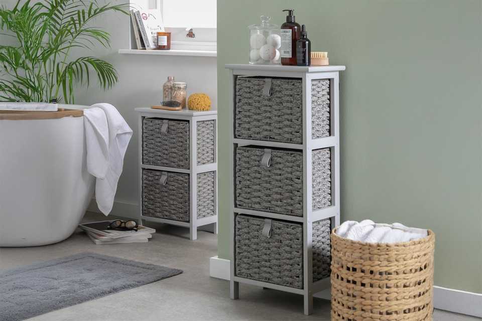 An Argos Home 2 and 3 drawer woven bathroom storage grey unit.