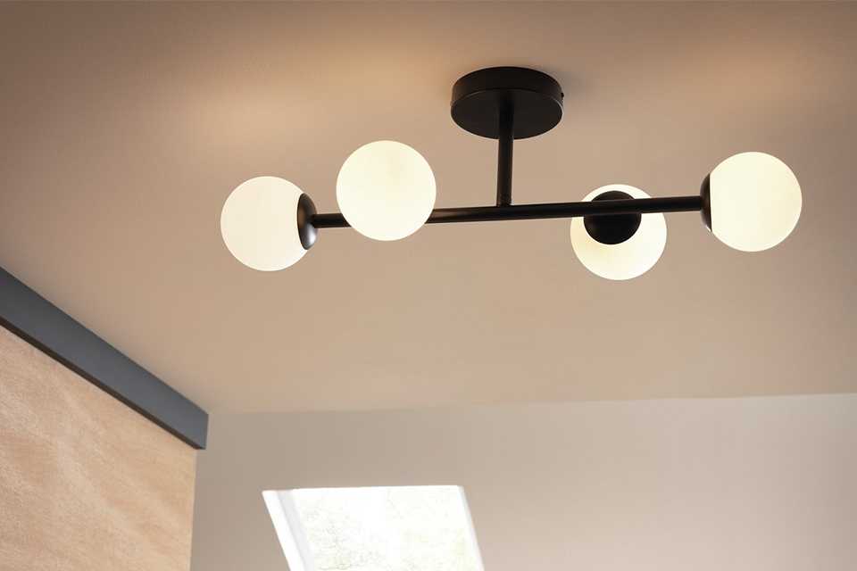 Ceiling light hanging in bathroom.