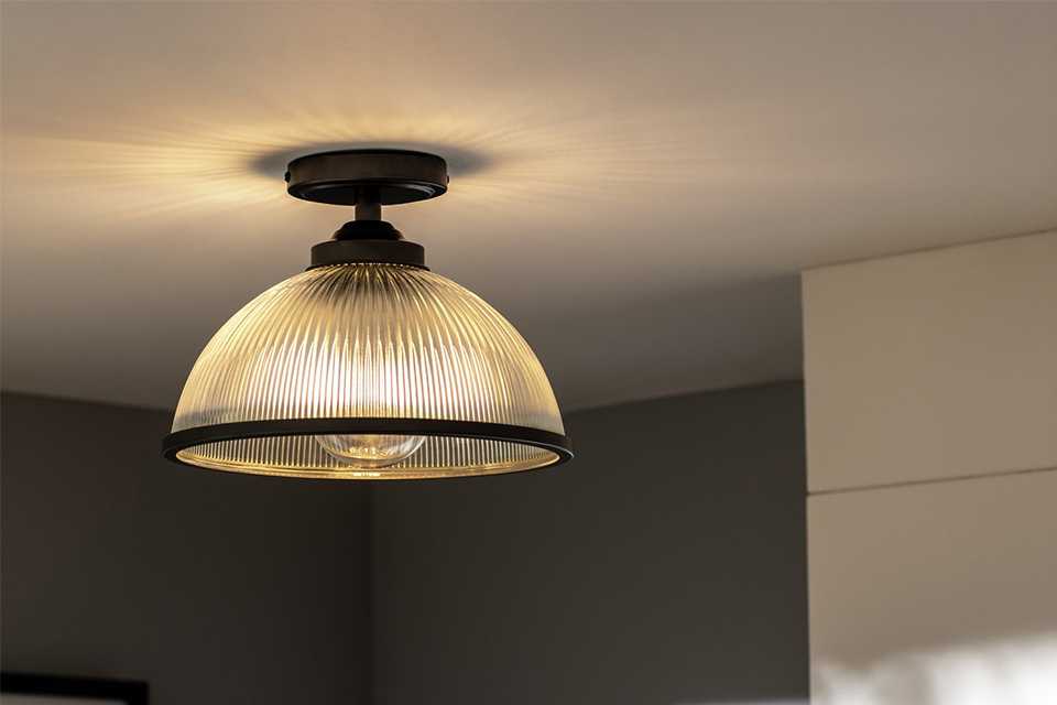 Glass lamp shade hanging.