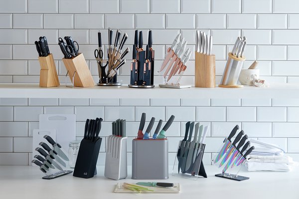 A banner depicting 5 sets of kitchen knives, including Argos Home 8 Piece Hollow Handle Knife Block Set - Black.