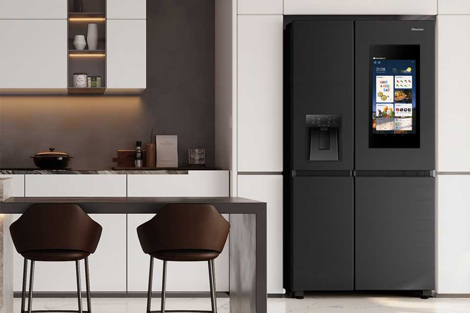A charcoal coloured Hisense fridge freezer in a kitchen setting.
