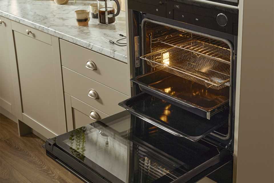 A Hisense oven placed on a counter in a kitchen.