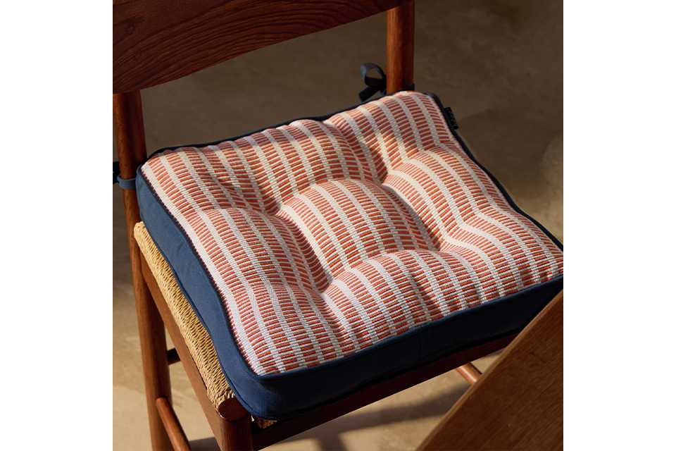 Kitchen textiles. Includes tea towels, aprons and oven gloves. Shop now.