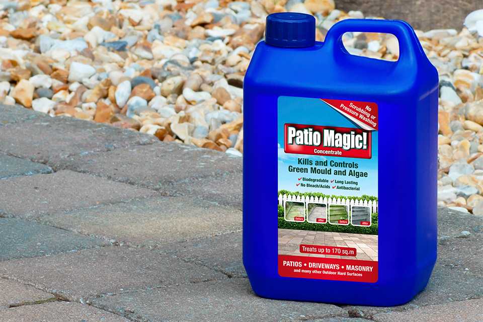 A blue plastic jar of Patio Magic patio cleaner.