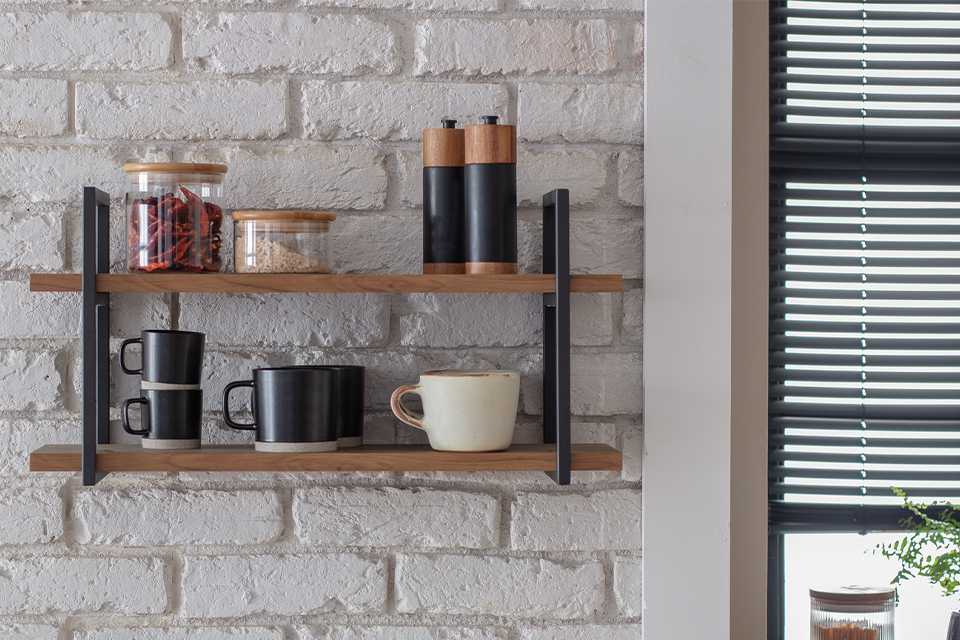 Habitat Nomad 60cm wall shelf in oak finish.