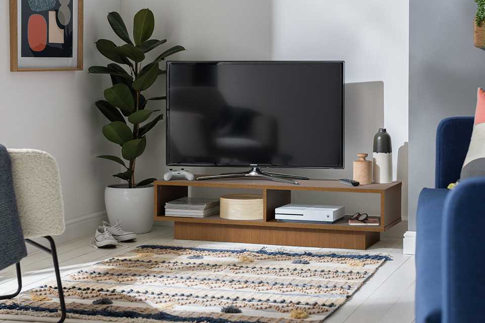 Argos Home Cubes 120 TV unit in white colour placed in a living room.