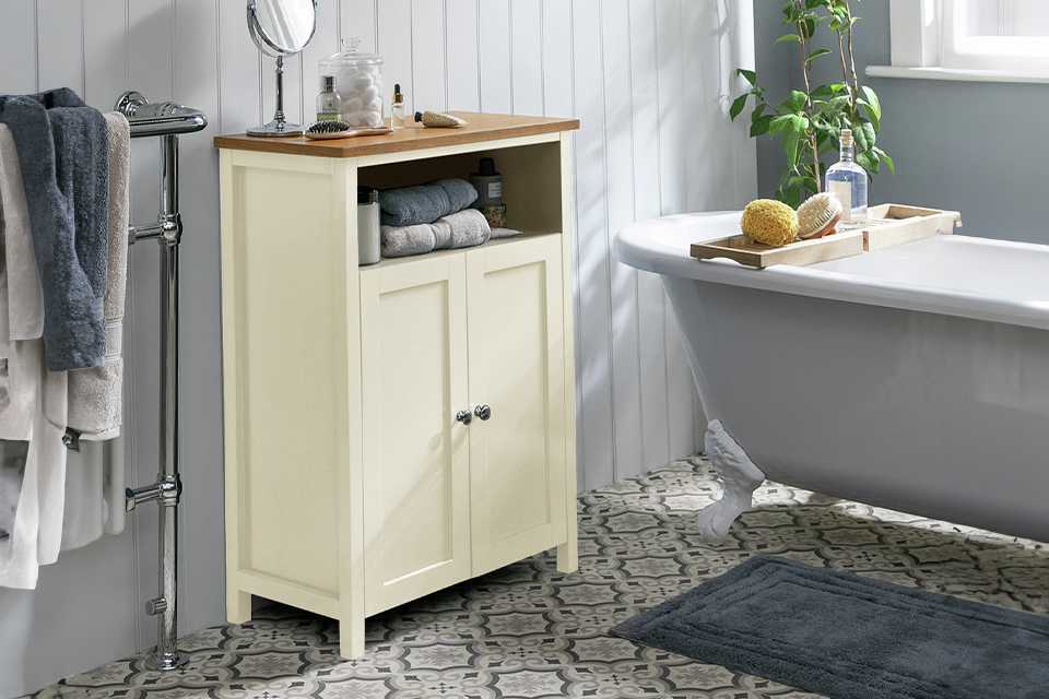 Argos Home Livingston double unit in cream colour placed in a bathroom next to a bathtub.