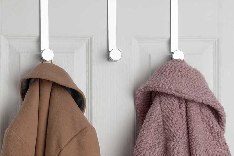 Argos Home Pack of 3 over the door stainless steel hooks hung over a door.