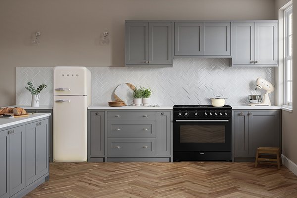 A shot of modular kitchen with Smeg appliances in it.