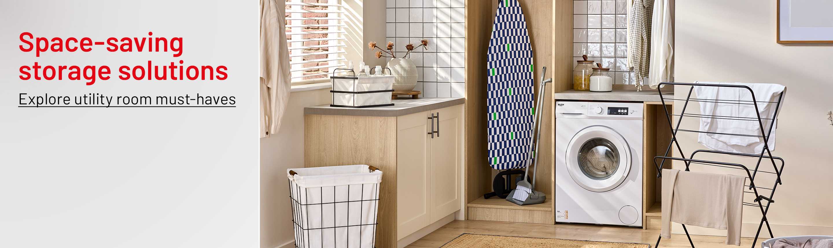 A washing machine, laundry basket, clothes airer, cabinet and an ironing board in a utility room.