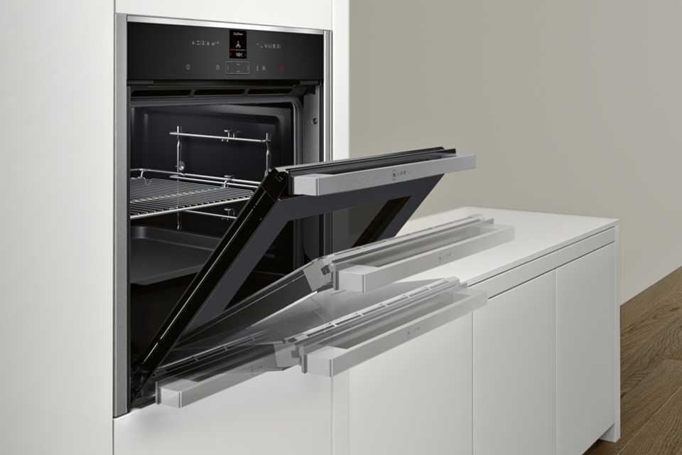 An oven with slide-away doors.