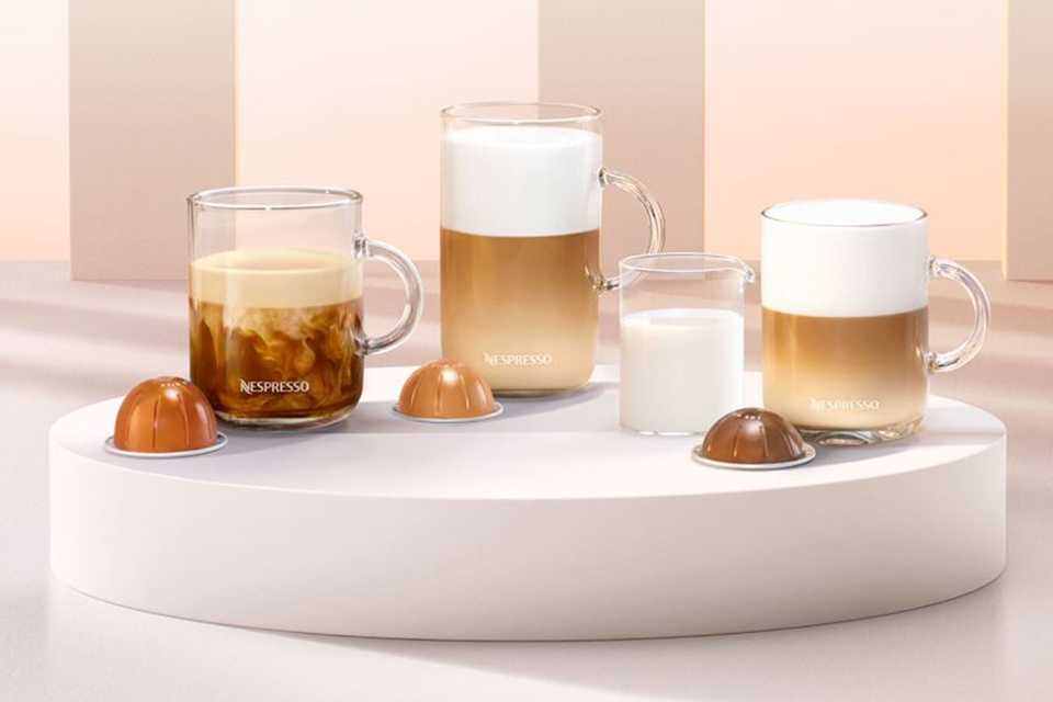 Three cups of barista-style coffee made with Nespresso Vertuo capsules.