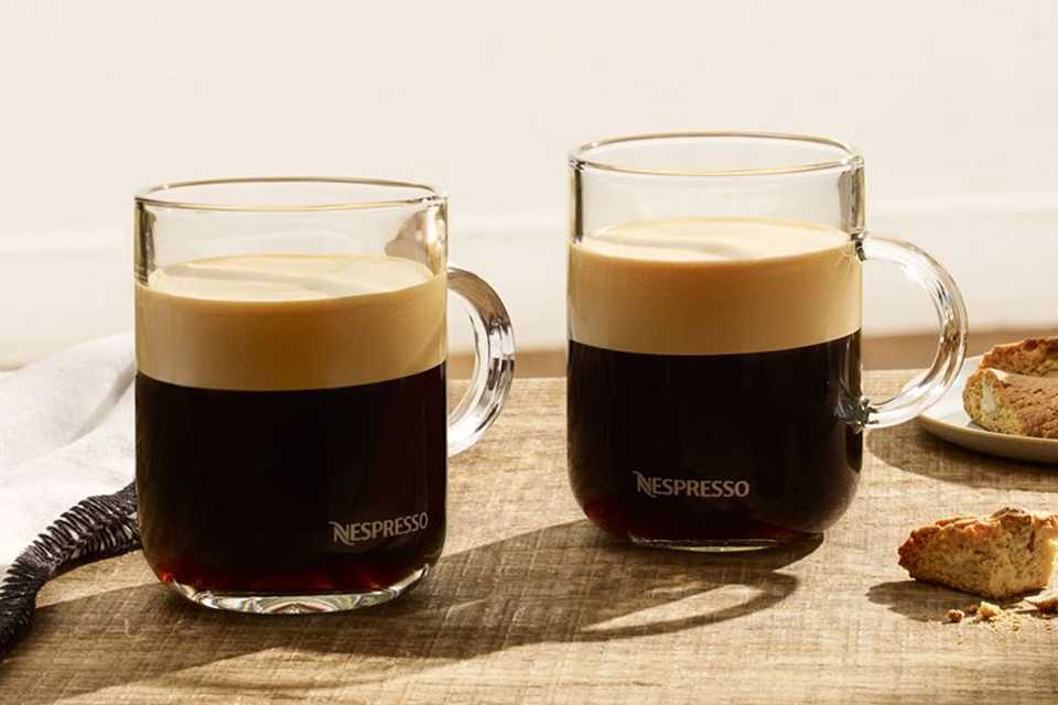 Two cups of coffee made with Nespresso Vertuo capsules.