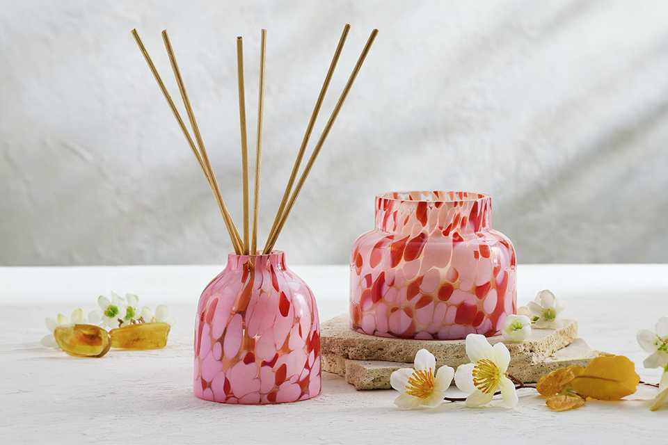 Habitat Confetti Glass reed diffuser with pink jasmine and amber fragrance.