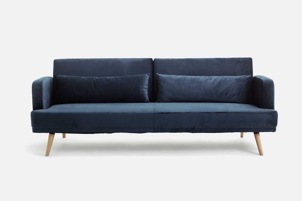 A blue Habitat Andy velvet 3 Seater Clic Clac sofa bed.