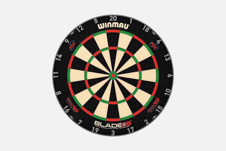 Winmau blade 6 championship dartboard and darts set.