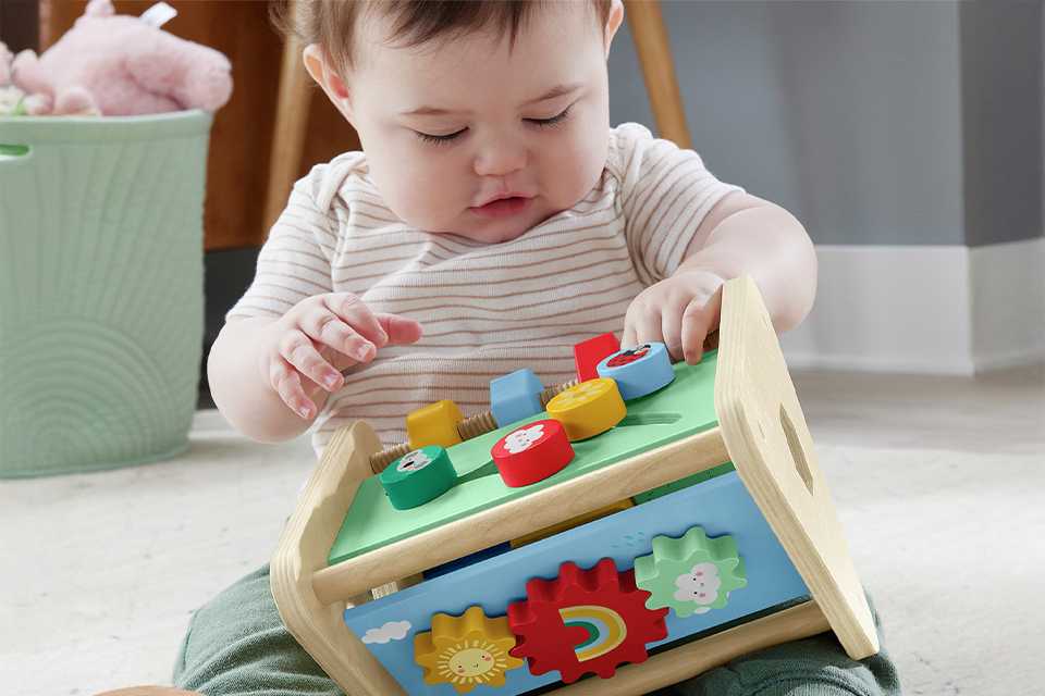 Fisher-Price Wooden Activity Triangle Fine Motor Toy.