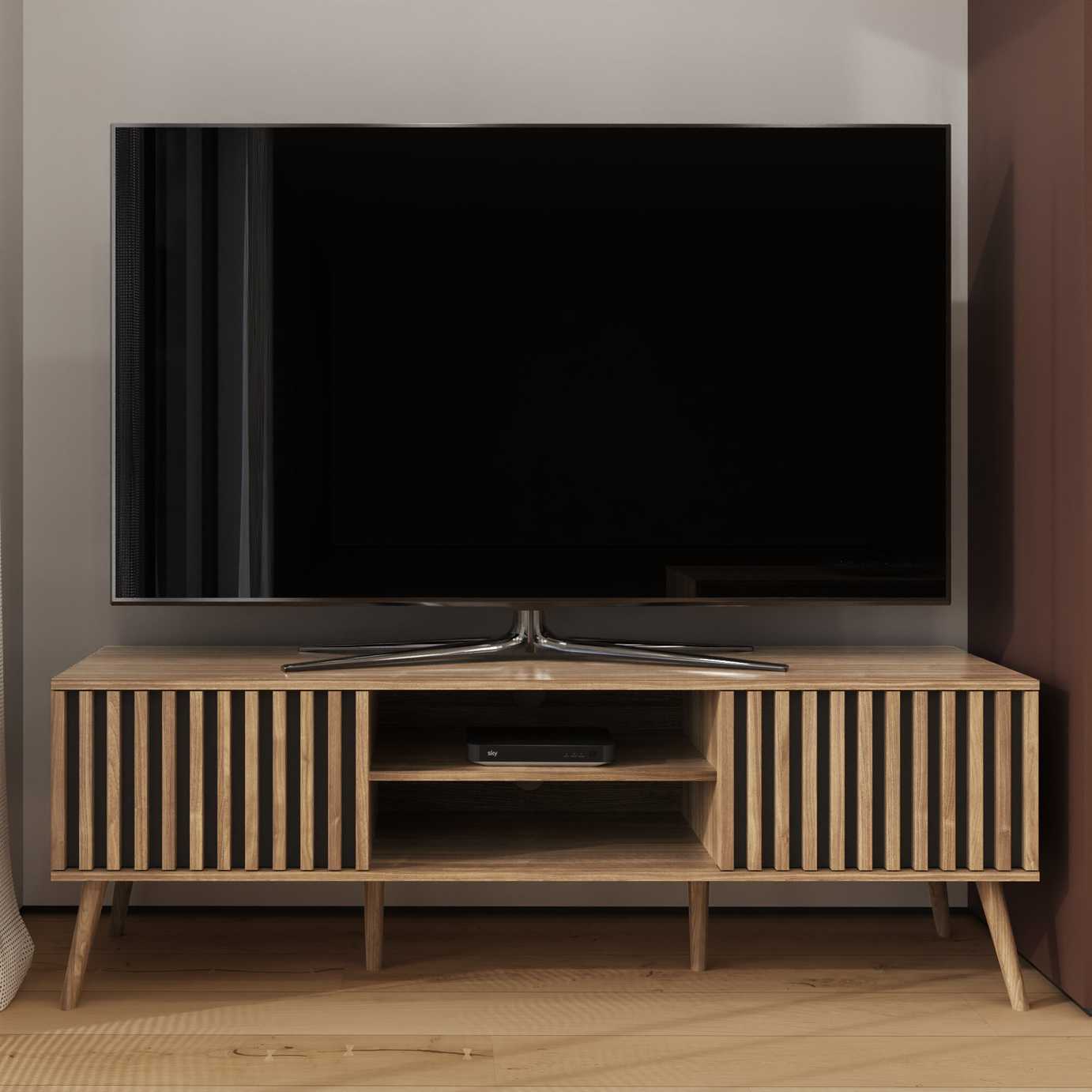 image of GFW Louvered 2 Door TV Unit - Natural with a tv on it in a room set up