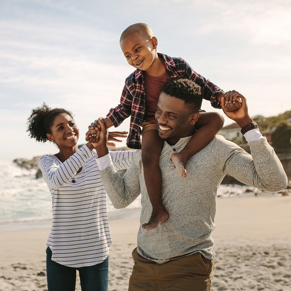 family on beach holiday