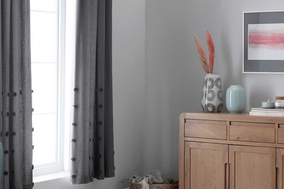 Living room window with curtains.