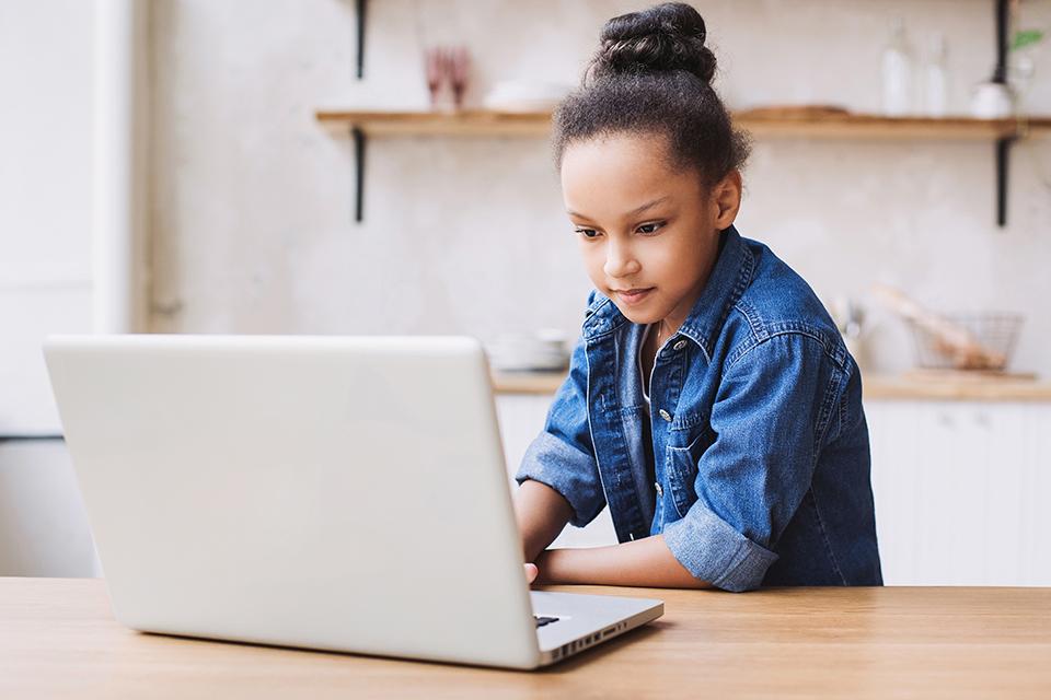 A girl learning from her laptop.