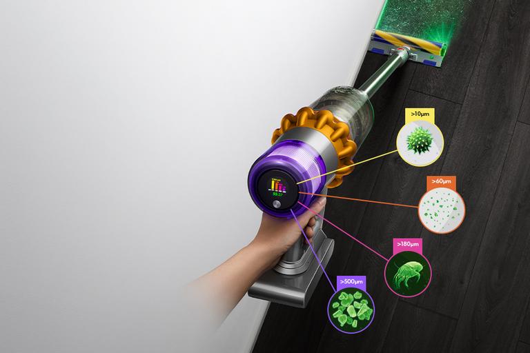 Dyson V15 Detect Absolute cordless vaccum with laser detect, displaying microscopic dust particles on it's screen.