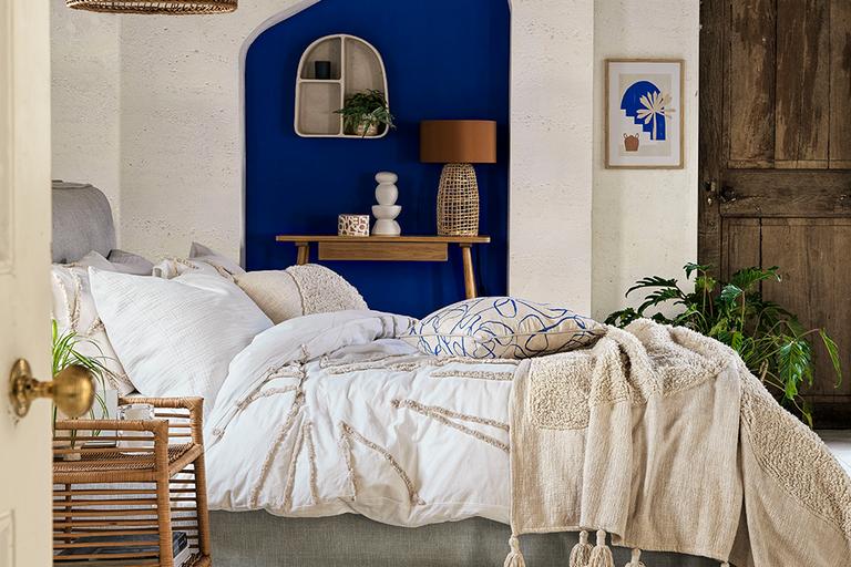 A bedroom designed in mediterranean style.