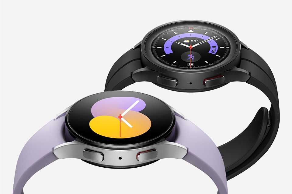 2 Samsung Galaxy Watch5's - one in silver with a lilac strap and one in all black.
