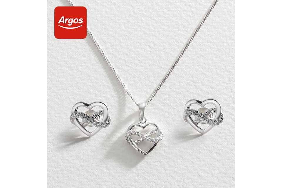 Silver necklace and earrings with a sparkly infinity symbol intwined.